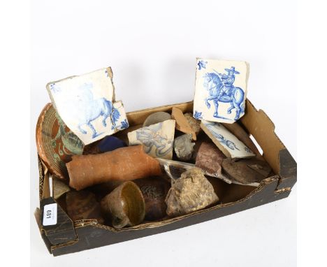 Various collectables, including an elephant's tooth, vertebrae, 16th century pottery pipe, Dutch Delft blue and white tiles e