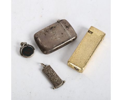 A silver Vesta, a bloodstone and silver swivel fob, miniature silver-cased cigar cutter, and a gold plated petrol lighter 