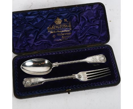 A Victorian silver Fiddle and Thread pattern spoon and fork, with shell embossed handles, in fitted case, retailed by Elkingt