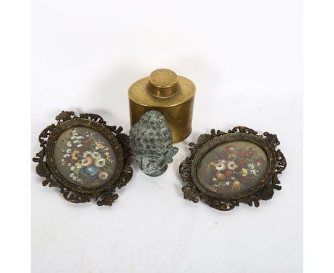 Antique engraved brass tea caddy, height 10cm, a pair of cast gilt-metal frames, and a verdigris Buddha's head 