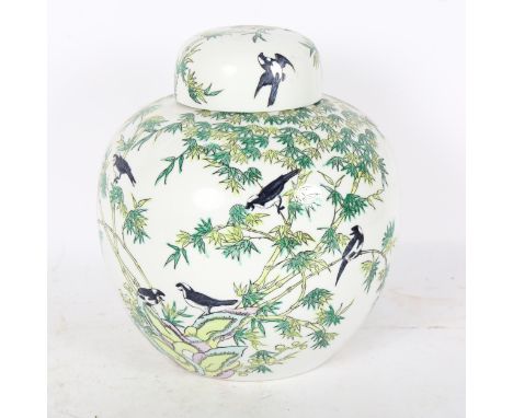 A large Chinese ceramic ginger jar, decorated with bamboo tree and birds, height 26cm 