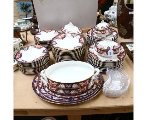 An extensive Royal Worcester Imari style dinner service, including sauce and vegetable tureens, and graduated set of meat pla