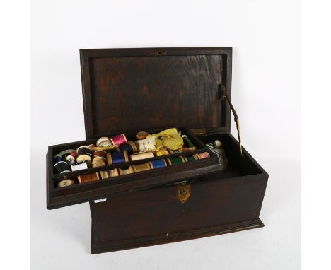 A stained wood sewing box, with tray-fitted interior and contents, 41cm across 