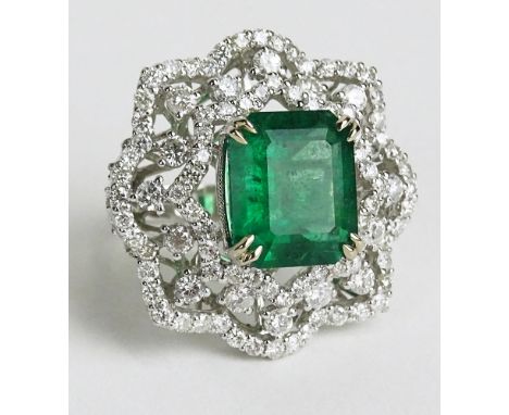 GIA Certified 7.08 Carat Octagonal Step Cut Emerald, approx. 3.72 Carat Round Cut Diamond and 18 Karat White Gold Ring. Emera