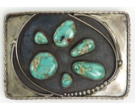 Vintage Navajo Sterling Silver and Turquoise Belt Buckle. Signed, attributed to: Ernest Benally. Good Condition. Measures 2-7
