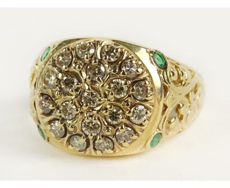 Vintage 14 Karat Yellow Gold, Diamond and Emerald Ring. Pretty Filigree Motif with a Round Pave Set with J-K Diamonds, Flanke