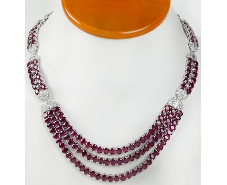 Fine Quality Approx. 85.00 Carat Oval Cut Ruby, 6.0 Carat Round Cut Diamond and 18 Karat White Gold Necklace. Rubies with Viv
