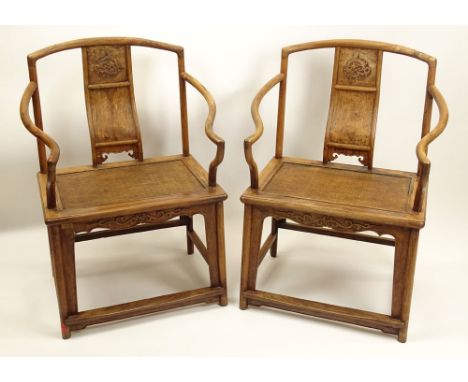 Pair of Vintage Chinese Huanghuali Ox Bow Back Chairs. Hand Carved, Woven Rattan Seats. Unsigned. One Seat in need of Minor r