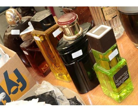 Large glass scent bottle dummy factices, comprising Colours de Benetton, Bogart pour Homme, K L'Homme, Leonard pour Homme and