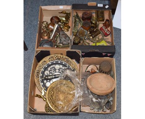 Assorted metal wares including an embossed copper powder flask, money boxes, jelly moulds, pierced classical style dishes and