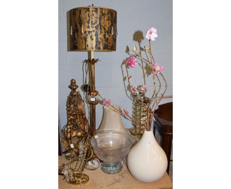 A group of decorative items including an owl form table lamp, a reproduction gilt mantle clock, a pair of silvered candle sta