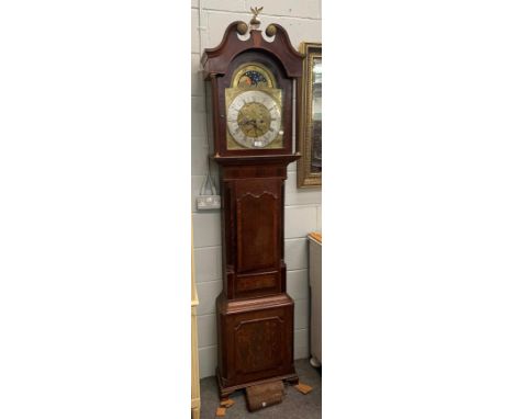 A George III oak and mahogany eight-day longcase clock with brass arch top dial, silvered chapter ring, moon roller and two s