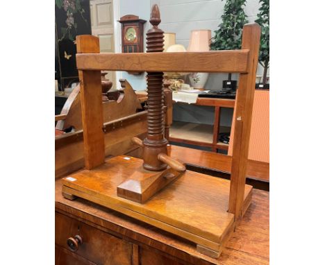 A Victorian mahogany book press, 61cm by 35cm by 66cm high 