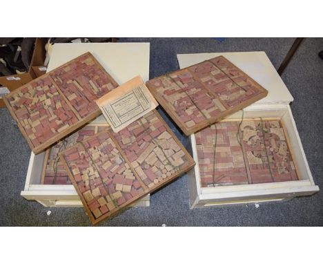Two painted homemade crates containing twelve trays of Victorian Richter building blocks together with one manual 