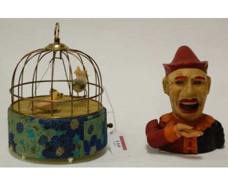 A reproduction bird automaton together with a cast iron novelty moneybox (2)