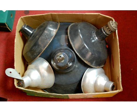 A collection of assorted industrial enamel light fitting shades