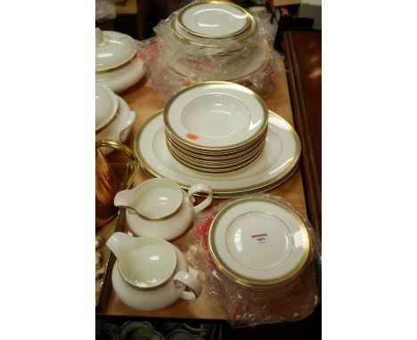A Royal Doulton part tea and dinner service in the Clarendon pattern