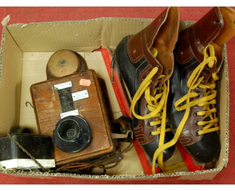 A collection of miscellaneous items to include pair of ice skates, brass oil lamp, wall mounted telephone and a gramophone et