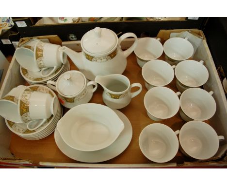 A Japanese ten place setting tea service on a white ground with floral decoration