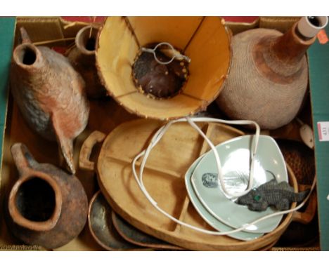 An African pottery vase converted to a table lamp together with various other pottery items, plates etc