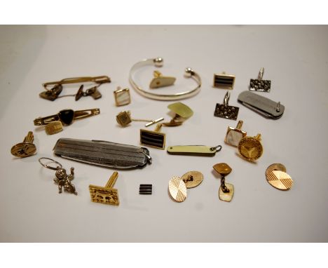 A collection of miscellaneous costume and other jewellery to include ladies silver locket on finelink chain, gents cufflinks,