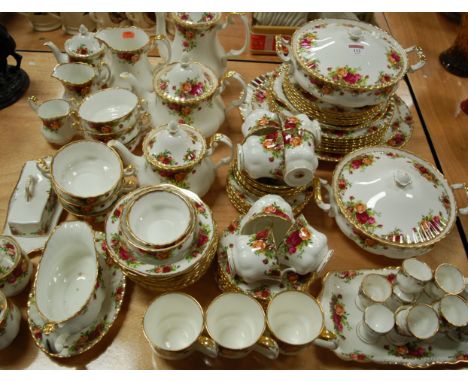 An extensive Royal Albert tea/dinner service in the Old Country Roses pattern to include meat plates, tureens, gravy boat etc