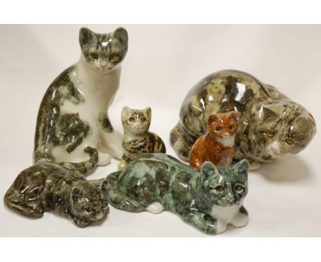 A collection of assorted ceramic cat figures to include Winstanley examples
