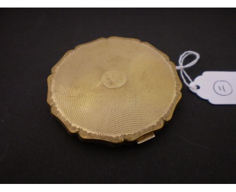A COMPACT BY STRATTON ENGINE TURNED METAL IN POUCH