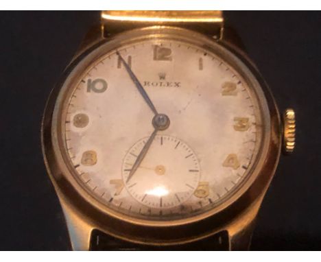 ROLEX . GENTLEMANS 1950s 9ct GOLD CASED ROLEX with seconds dial. Dennison case.Condition report, working at present, could do