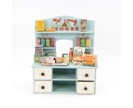 Mid 20th century Triang Stores children's shop shelves with a collection of original cardboard packets, glass sweet jars and 