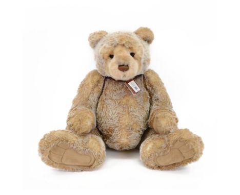 Charlie Bears large plush jointed teddy bear 'Ian', with light brown fur and brown bow, designed by Isabelle Lee, with tags, 