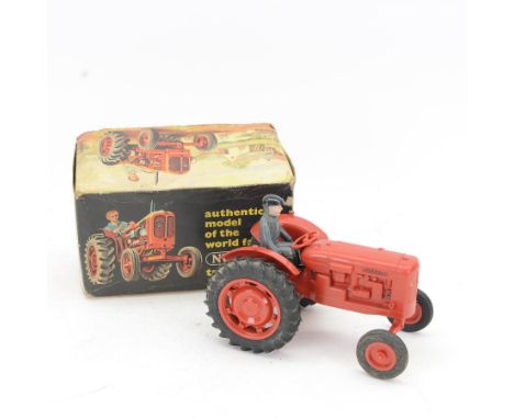 Pippin Toys Nuffield Tractor model, with red plastic body, rubber tyres and matched plastic farmer figure, in original box