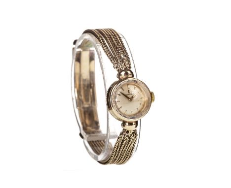 LADY'S OMEGA NINE CARAT GOLD MANUAL WIND COCKTAIL WATCH, 1960s, signed Omega movement, the round dial with applied gold baton