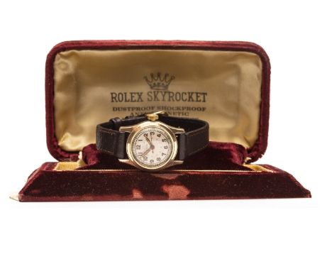 LADY'S ROLEX STANDARD MANUAL WIND WRIST WATCH, 1940s, the round white dial with Arabic numerals in gold, railroad outer secon