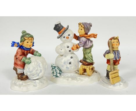 A group of Goebel Hummel Christmas figurines comprising a 'Making New Friends' snowman figure (losses, marked verso- no. 2002