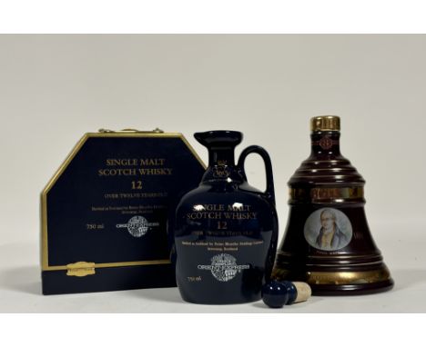 A Bell's Great Scottish Investors Christmas 2002, Old Scotch Whiskey bell shaped decanter, unopened (vol 40%) together with a