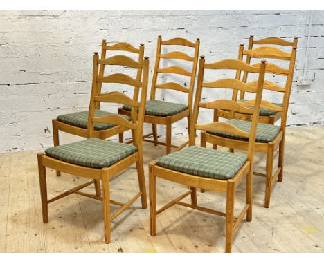 Ercol, a set of six model 823 elm dining chairs, with ladder backs and slatted seats, raised on turned tapered supports unite