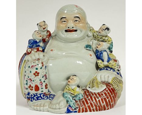 A good, large Chinese porcelain laughing Buddha/Budai seated figure decorated with famille rose type polychrome enamels and m