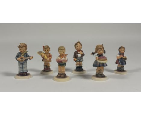 A collection of Hummel figures comprising, "Sweet as can be", "From me to You", "Cheeky Fellow", "Honour Student", "Little Tr