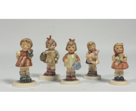 A collection of Goebel Hummel figurines comprising, "Natures Gift", "My Luck Pig, Pigtails", girl holding doll, "Puppet Princ