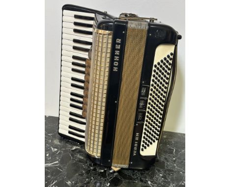 A Vintage Honner Verdi III M piano accordion in black in good condition with straps and carry case&nbsp;