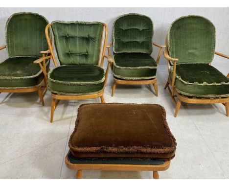 Four vintage Ercol stick back down swept open armchairs, one of slightly different design, accompanied by matching foot stool