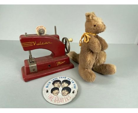 Nostalgic Items. Three childhood nostalgic items, a Vulcon minor sewing machine, plush kangaroo and a large Beatles button ba
