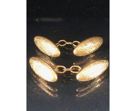 Pair of 15ct 625 Gold marked oval cufflinks with engraved floral swags total weight approx 4.9g