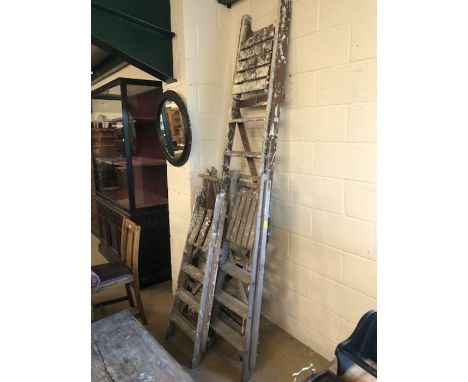 Four vintage wooden step ladders, useful for decorative or shop display, tallest approx 247cm, the smallest 120cm 