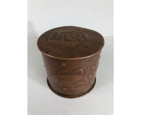 NEWLYN: Copper tea caddy with Lid and repousse decoration of swimming fish with makers mark Newlyn