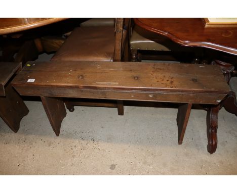 An antique pine bench 