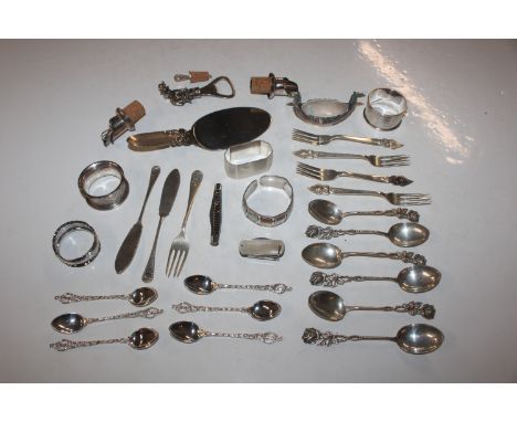 Four silver napkin rings; two silver knives; a silver fork and four Siam Sterling silver forks, approx. total weight 5oz (199
