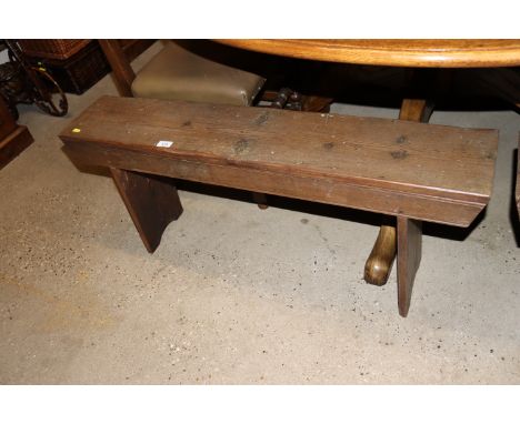 An antique pine bench 