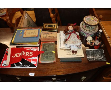 A Barber's shop Burma Shave sign; a Jenners pennant; a pair of boxed hair clippers; a cut throat razor; various books; vintag